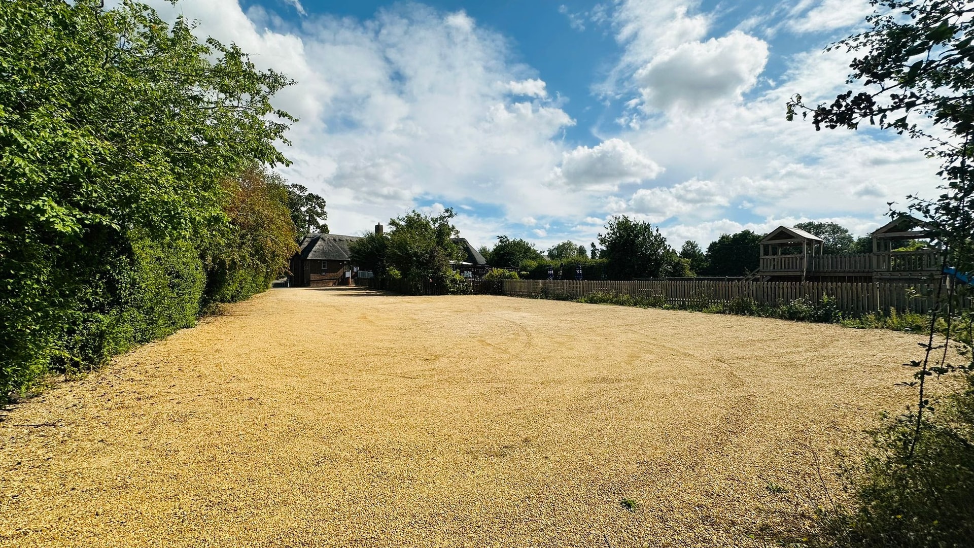 Large gravel car park with ample free parking at Old Crown Girton